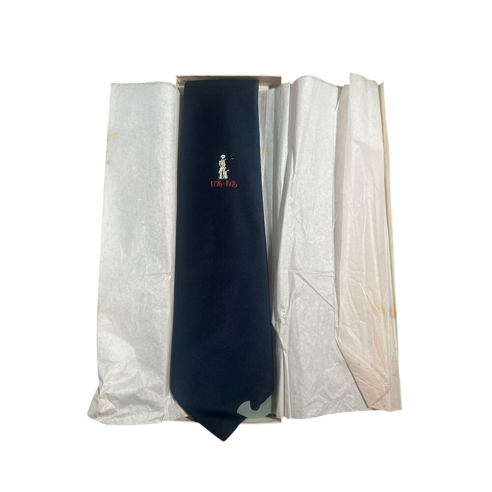 navy blue polyester necktie with a 1776-1976 bicentennial embroidery.